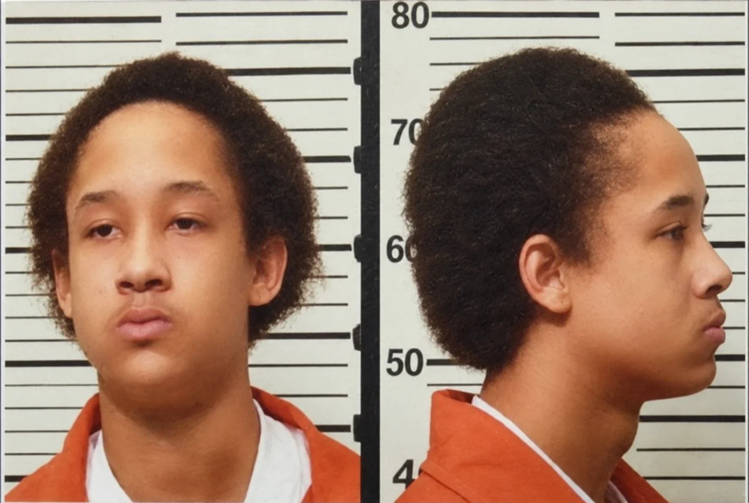 Booking photo of Paul as a teenager, front and profile, in an orange jumpsuit